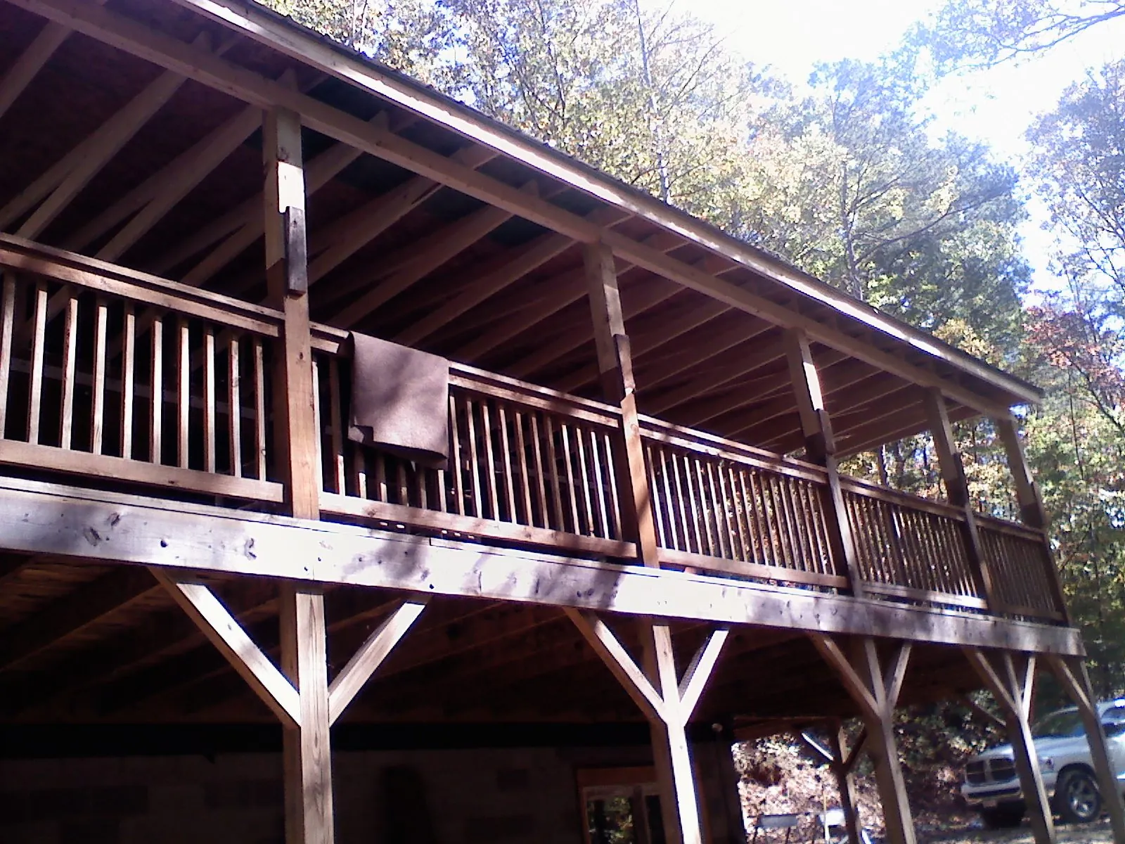 Timber framing under a new elevated porch and deck — Roof Leak Repair in Slinger by Roofing Brothers